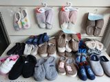 many pairs of slippers that are on a table