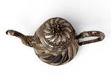 silver teapot on a white background with a white background