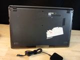 a laptop that is sitting on a table with a mouse on it