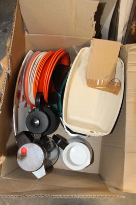 a cardboard box with many different items inside of it