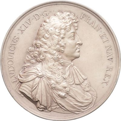 une image représentant une pièce d'argent sur laquelle figure le portrait d'un homme