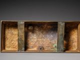 an image of a metal box with a hole in it