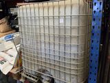 an image of a metal container on a shelf in a warehouse