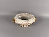 an image of a white bowl with a hole in it