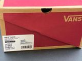 a box that has a pair of shoes inside of it