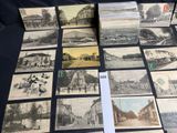 several old black and white photographs of buildings and people