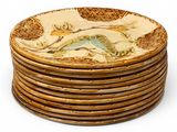 a lot of plates that are stacked on top of each other