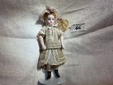 a doll that is sitting on top of a table