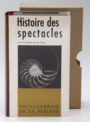 an open book with a picture of a spiral design on it