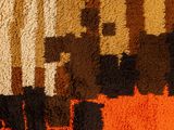 a close up view of a rug with a pattern on it