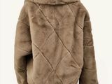 an image of a woman ' s jacket on a mannequin mannequin mannequin mannequin mannequin mannequin manne