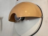 a light that is on the wall next to a clock