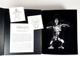 an open book with a drawing of a woman on it