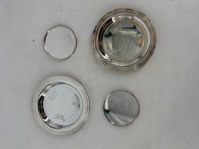 a lot of silver items that are on the table