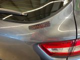 a car that has a sticker on the back of it