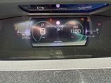 a car dashboard with a digital display on it