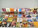a lot of music cds on the table