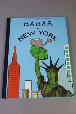a book with a picture of the statue of liberty on it