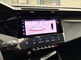 the dashboard of a car with a gps device in the center