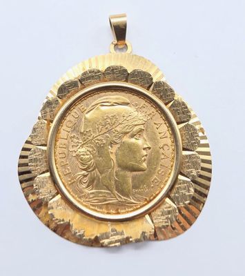 an image of a gold coin with a woman ' s face on it
