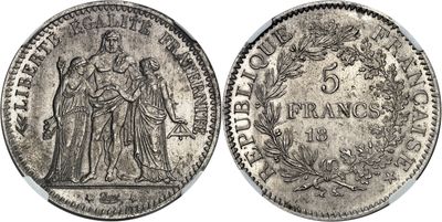 a silver coin with an image of a man and woman on it