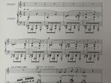 a black and white image of a sheet of music with notes