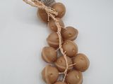 a bunch of chocolate candies hanging from a string