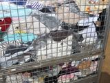 a metal cage filled with many different types of items