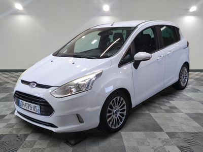 the white ford b - max is parked on a checkered floor