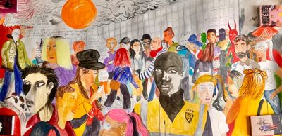 une peinture d'un groupe de personnes sur un mur