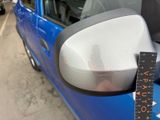 a close up of a car ' s side view mirror with a ruler on the side of the mirror