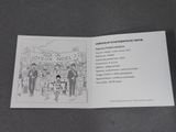 an open book with a drawing of people on it