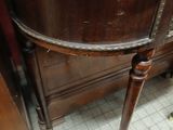 a table with a marble top on it in a room
