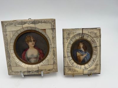 pair of miniature paintings of women in frames on a white background