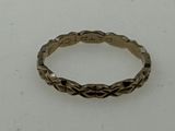 an image of a silver ring on a white surface