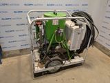 an image of a machine with a green tank on top of it
