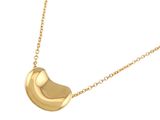 the gold plated necklace has a crescent shaped pendant on a gold chain
