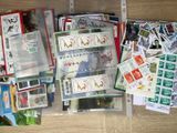 many different types of stamps on the table