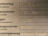 a close up of a metal plate with numbers on it