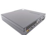 the back view of a laptop computer with a hard drive on top of it