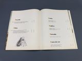 an open book with a picture of a chess game on it
