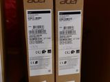 three boxes of acer laptops sitting on top of a table