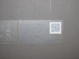 an image of a close up of a label on the back of a laptop