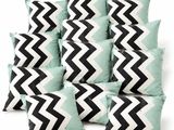 black and white chevrond pillows on a white background