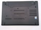 a black laptop that is sitting on a white table