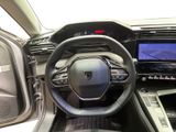 the interior of a car with a steering wheel, dashboard, and dash board