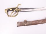 two different types of swords on a white surface