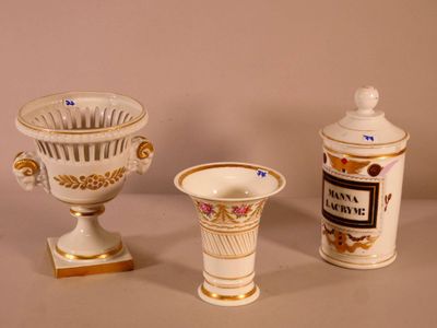 three vases sitting next to each other on a table