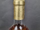 a bottle of liquor that is sitting on a table