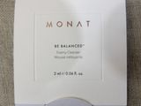 the box is white and has a label on it that says monat